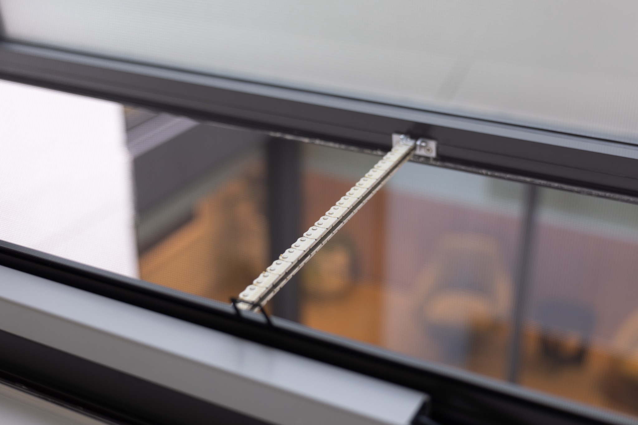 Interior view of a D+H CDC chain drive operating an awning window on a Chatswood project