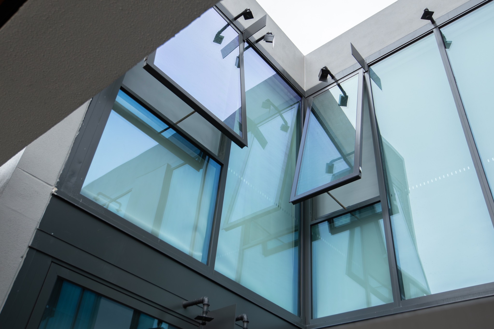 Close view of a D+H CDC chain drive and window connection on a Chatswood project